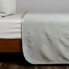 Trettino Bedspread from Bella Notte Linens in the color Cloud.