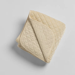 Silk Velvet Quilted Throw Blanket from Bella Notte Linens in the color Crema.