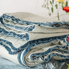 Folded Paloma Throw Blanket in the color Eucalyptus from Bella Notte Linens. 