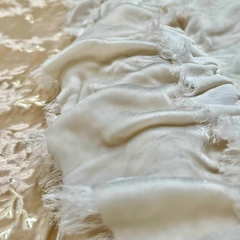 Detail of the Loulah Throw Blanket in Bella Notte Linen's newest color, Crema. 