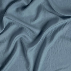 Madera Luxe Flat Sheet from Bella Notte Linens in the color Tahoe Blue.