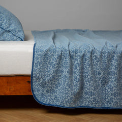 Vienna Coverlet from Bella Notte Linens in the color Tahoe Blue.