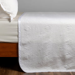 Trettino Bedspread from Bella Notte Linens in the color Winter White.